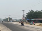 Lindungi Kesehatan Warga dari Kabut Asap, KKN 143 UMRI Bersama Pemdes Buluh Rampai Imbau Warga Gunakan Masker