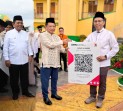 Apresiasi Program Digitalisasi Masjid, Mendagri Serahkan QRIS ZISWAF BRK Syariah di Kepri