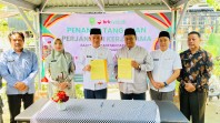 Bapenda Inhu dan BRK Syariah Air Molek Teken Kerjasama Penerimaan Pembayaran Pajak dan Retribusi Daerah