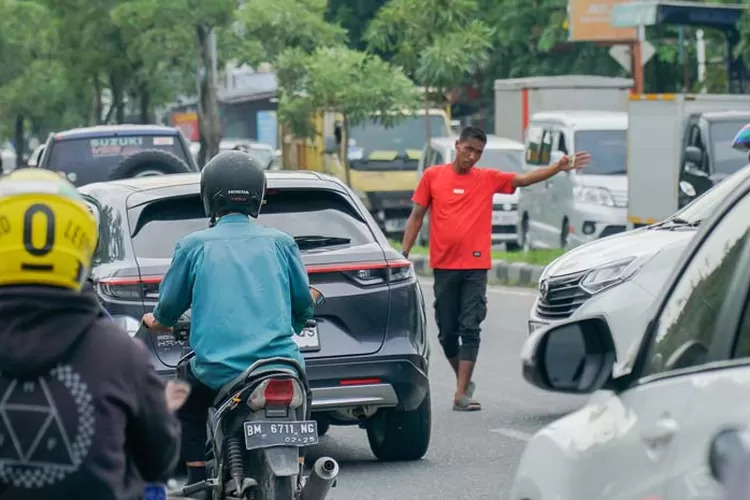 Bandel, Dishub Masih Temukan Pak Ogah di Sejumlah Titik Ruas Jalan di Pekanbaru