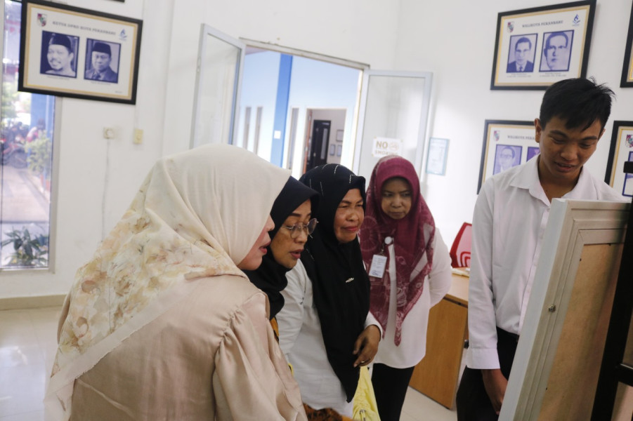 Jaga Dokumen Penting Keluarga, Dispusip Kota Pekanbaru Ajak Masyarakat Gunakan LAPAK